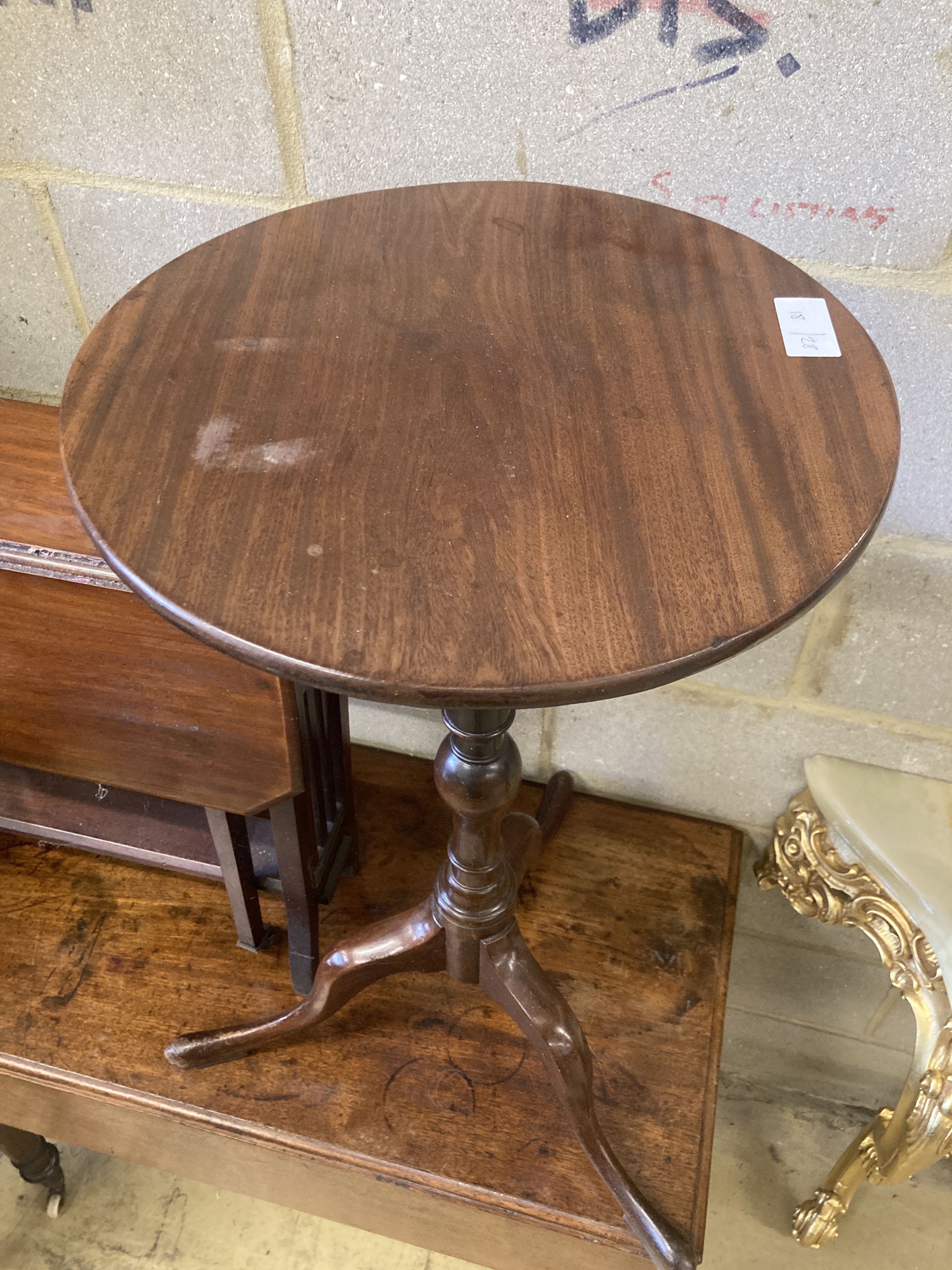 An early 20th century mahogany tripod wine table, 38cm diameter, height 74cm, together with an Edwardian mahogany Sutherland table